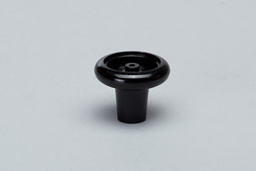 Knob with insert